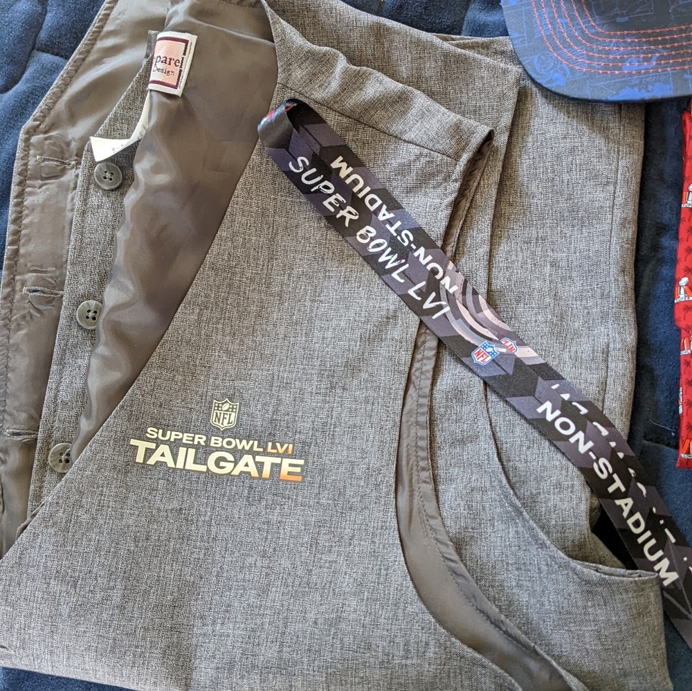 SuperBowl paraphernalia, including cap, tie, and vest